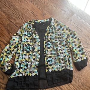 Calvin Klein size XS but fits a Small.